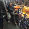 Photo: Subway Seat Hog Stares Into His Own Future, Sees This Headline